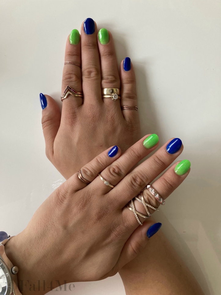 Royal blue nails with chlorophyll nails in between.